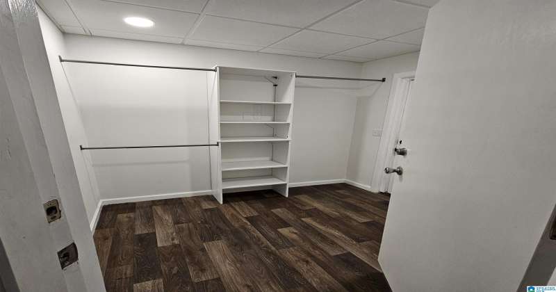 large walk in closet has a door leading outside. It would be perfect to add a private outdoor hot tub!!