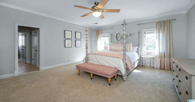 In addition to a large walk-in closet, this bedroom has a 