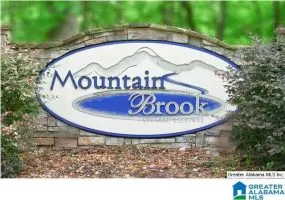 Mountain Brook Estates is a Gated Community Lot 7 in Mountain Brook consists of 3.1 acres and has 127 feet of deep year around water frontage
